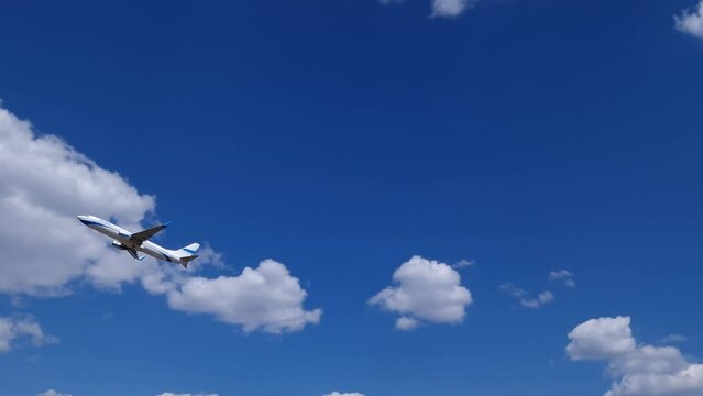 passenger airplane enter air in flight at against a blue sky with white clouds. natural sound
