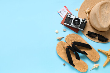 Composition with beach accessories, passport, ticket and photo camera on color background. International Women's Day