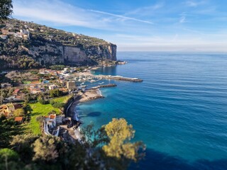 Fototapeta na wymiar The Magnificent Amalfi Coast in Italy is a breathtaking stretch of coastline renowned for its dramatic cliffs, charming villages, and crystal-clear waters.