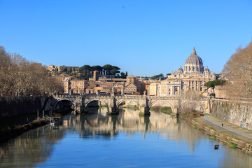 Landscape view of The Tiber River, with reflection of old buildings and bridge, it is the third-longest river in Italy and the longest in Central Italy