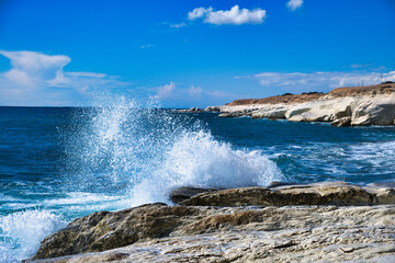 Waves crashing on the white limestone cliffs near Governor’s Beach, district of Larnaca, at the...