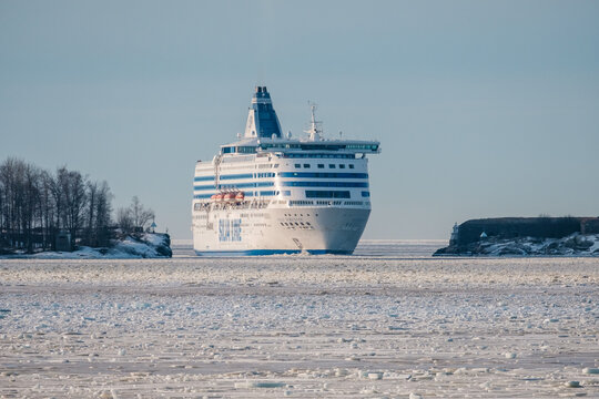 Passenger car ferry MV Silja Serenade, operated by Silja Line, passing the strait of Kustaanmiekka on clear winter morning.