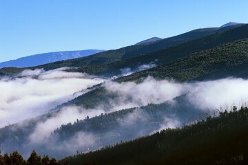 Misty Mountain landscape with clouds
