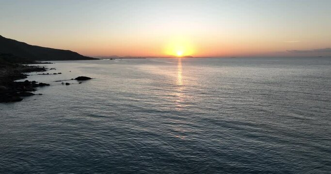 Aerial footage of beautiful sea wave and sunrise landscape