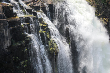 Water flowing over the crest of Victoria Falls