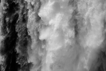 Abstract image of water rushing over Victoria Falls - obrazy, fototapety, plakaty