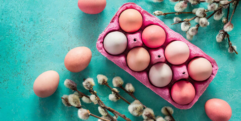 Eggs in a basket, top view of bright pink egg tray with thirty eggs prepared for Easter celebration. - Powered by Adobe