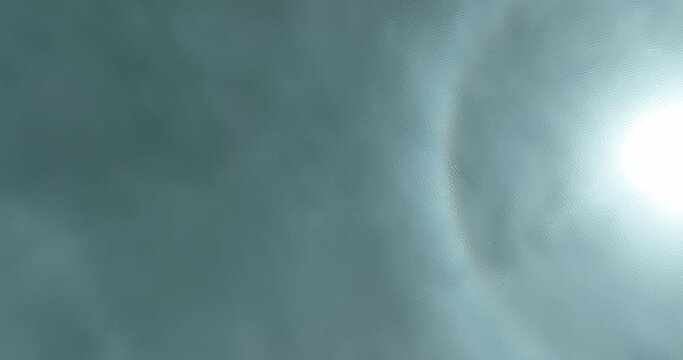 The reflection of sun in the high altitude lake water