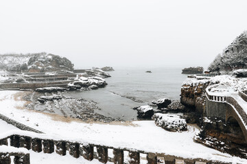 Beach of Fishermen Port with snow in Biarritz. Basque Country of France. - 749587360
