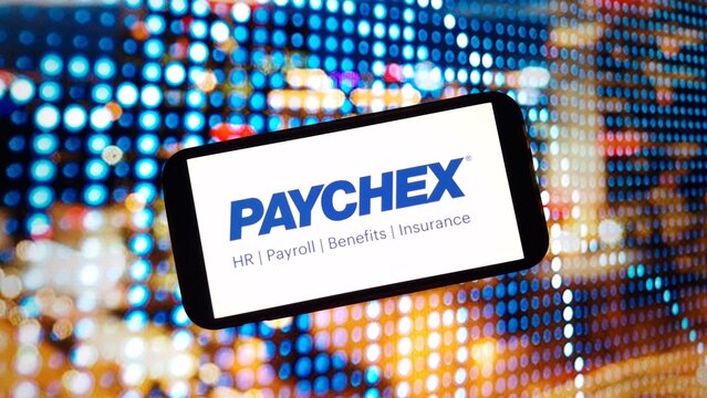 Konskie, Poland - March 02, 2024: Paychex company logo displayed on mobile phone screen
