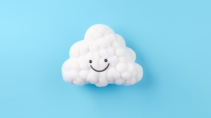 Knitted toy white cloud on a blue background. Children's clothes and accessories. View from above.