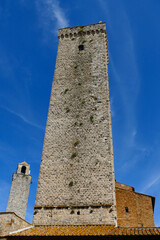 Les maisons-tours de la ville médiévale de San Gimignano en Toscane  - obrazy, fototapety, plakaty