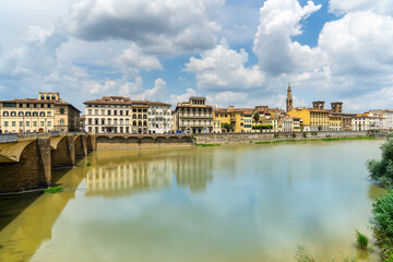 Fototapeta na wymiar Florence, Tuscany. Ponte Vecchio (Holy Trinity) medieval stone bridge over the Arno river. Italy