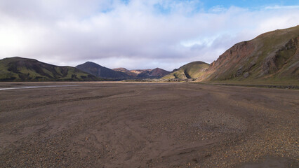 Fototapeta na wymiar Landmannalaugar is a location in Iceland's Fjallabak Nature Reserve in the Highlands. It is on the edge of the Laugahraun lava field. This lava field was formed by an eruption in 1477.