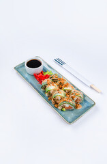 Fresh rolls with salmon, vongole, avocado, rice paper and teriyaki.