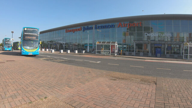 Liverpool, England, September 9, 2023: An airport transfer bus outside the Liverpool John Lennon Airport is an international airport in Liverpool, England, on the estuary of the River Mersey.