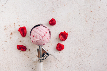 Raspberry ice cream in a scoop