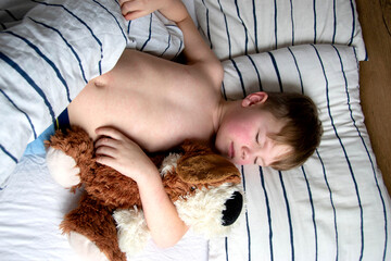 Viral disease. Measles rash on the body of the child. Allergy