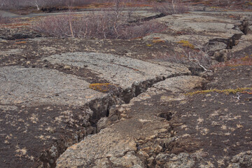 Fault zone (Thingvellir National Park, Iceland). Basalt lava. Iceland National Park canyon continental divide plate rock rift during day , view of landscape with rocky mountain.