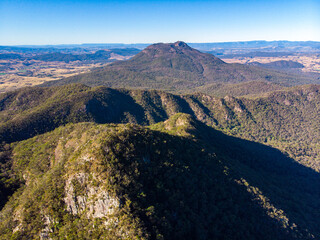 aerial (drone) panorama of mount may in mount barney national park with mount barney and mount maroon in the background; hiking mighty mountain in queensland, australia