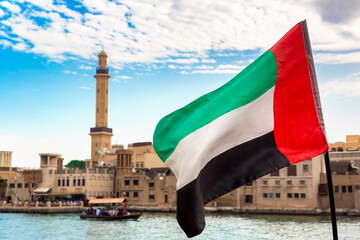 UAE flag and Abra boat in Dubai - 749643191