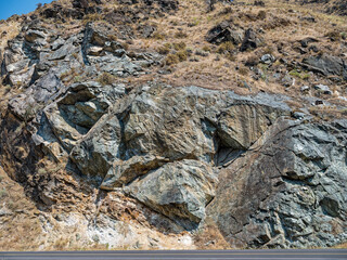 Rocky cliffs along the side of the road north of Riggins, Idaho, USA