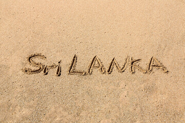 Sri Lanka written in a sandy - 749647181