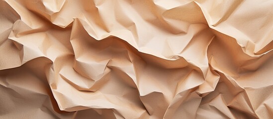 A detailed view of a beige fabric with delicate ruffles, creating a textured background suitable...