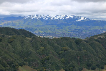 Snow falls on Mt Diablo as the summit is obscured in clouds