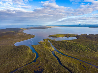 aerial panorama of unique ecosystem of noosa everglades - beautiful curvy noosa river and lush,...
