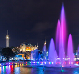 Fototapeta na wymiar Hagia Sophia and Sultan Ahmet Park Fountain at Night