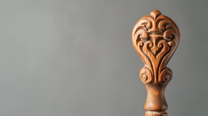 Close-up of a finely carved wooden ornament displaying intricate craftsmanship