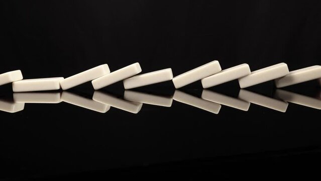 Dominos falling collapsing on table 4