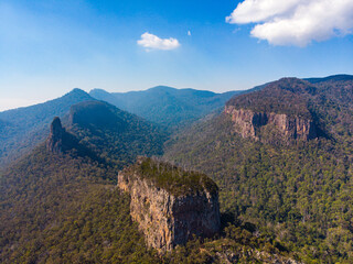 Fototapeta na wymiar aerial panorama of mountains in main range national park, queensland, australia; famous rocky mountains - the steamers near mount superbus