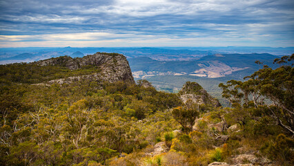 panorama of mount maroon as seen from the trail to the summit; rocky mountain in mount barney national park, queensland, australia