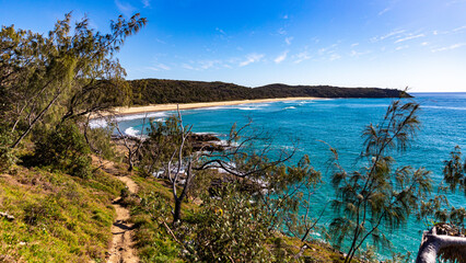 panorama of alexandria bay in noosa national park as seen from the cliifs near sunshine beach, famous coastal walk in queensland, australia