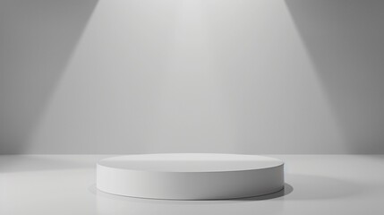 A minimalist white podium on a seamless white background illuminated by a soft overhead spotlight creating a perfect setting for an elegant product presentation
