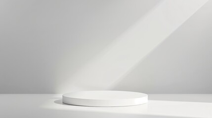 A minimalist white podium on a seamless white background illuminated by a soft overhead spotlight creating a perfect setting for an elegant product presentation