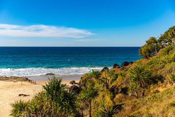 panorama of froggy beach as seen from point danger cliffs; unique shore of gold coast, queensland, australia