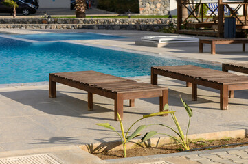 sun loungers near the cafe and pool in a residential complex 1