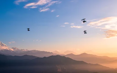 Rollo Annapurna flying ultralight aircraft over the Mount Annapurna range in Nepal.