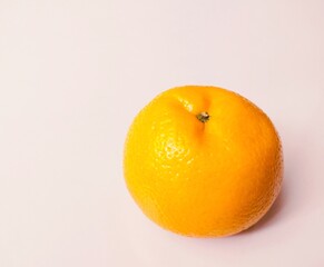 Single orange citrus fruit food fresh ripe juicy whole kinnow raw santra closeup naranja image...