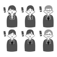 はっと驚いた表情の会社員たち