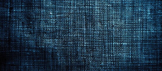 A dark blue background with small, uniform squares of varying shades creating a textured and...