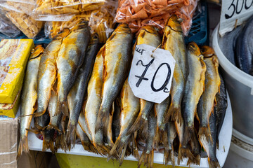 smoked fish at the market - 749733792