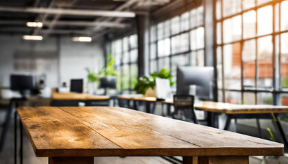 Empty wooden table with a blurred industrial office background, ideal for product display. - obrazy, fototapety, plakaty