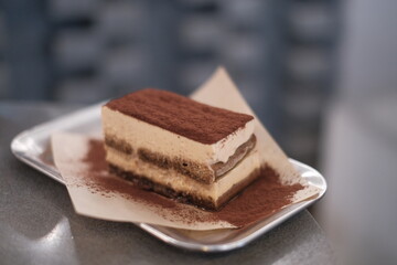 Photo of tiramisu dessert. Photographing desserts for restaurant and cafe menus. Food Photography
