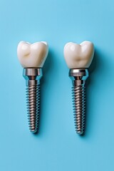 Two dental implants with heart-shaped crowns on a teal background.