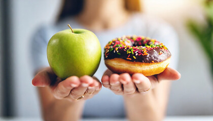 woman's hand holds an apple in one hand and a donut in the other against a neutral background, symbolizing health choices
