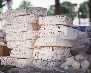 Oriental sweets at the Siab Bazaar in the ancient city of Samarkand in Uzbekistan, nougat with nuts...